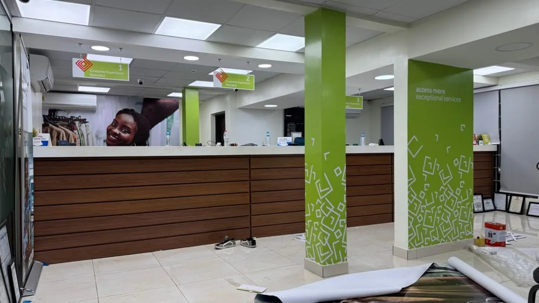 Teller counters and customer experience desks within the branch