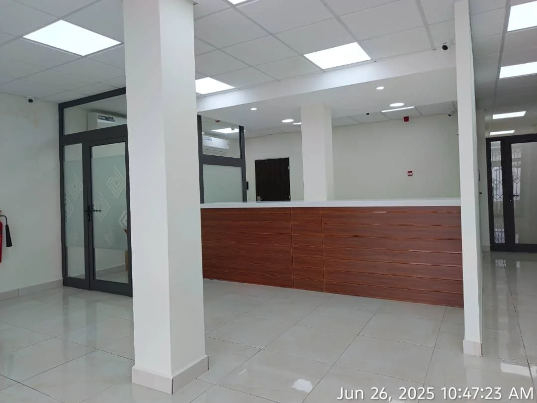 Reception and enquiry counter finished in timber and stone